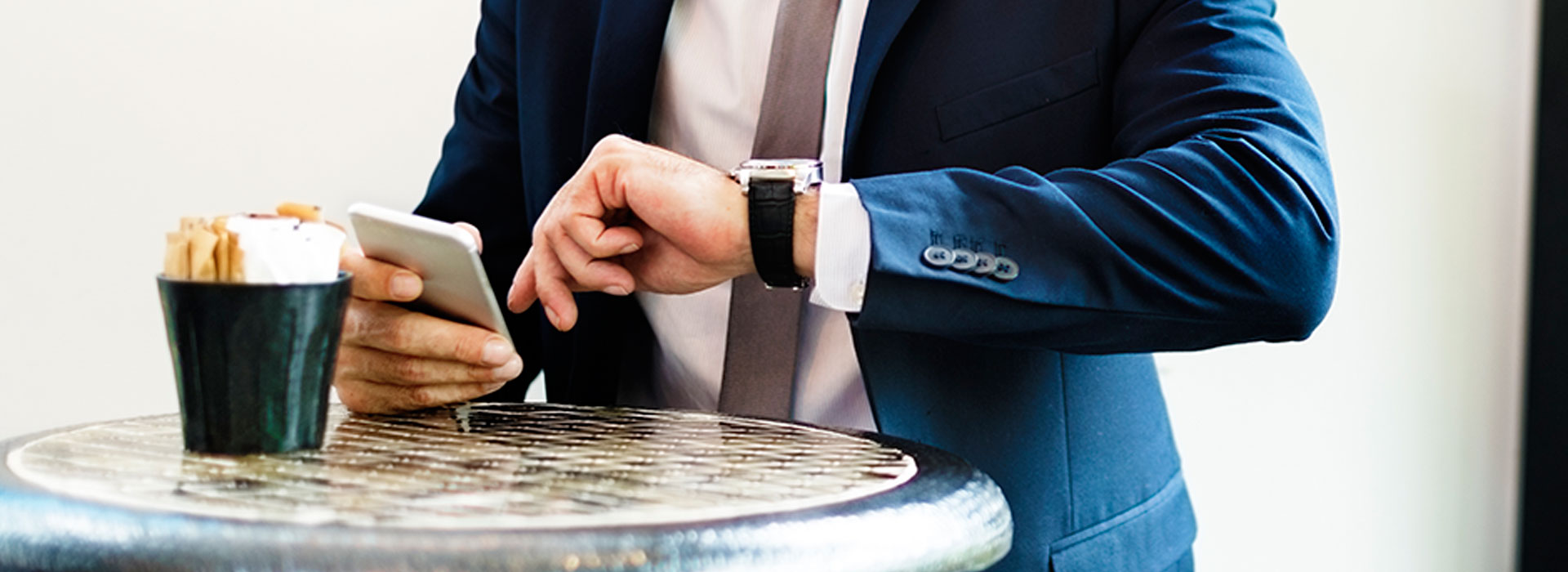 Businessman Checking Time Watch Concept
